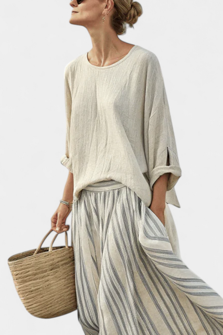 Aurora – comfortable blouse and striped midi skirt