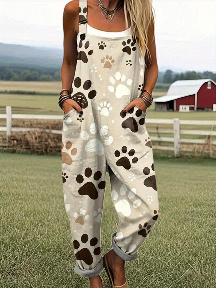 Grote maten, elegante overall voor dames in grote maten - Beige en bruine pootafdrukpatronen, machinewasbare polyester overall voor dierenliefhebbers, alledaagse en formele kleding - Comfortabele H-vormige contour met speels dierenpootafdrukontwerp