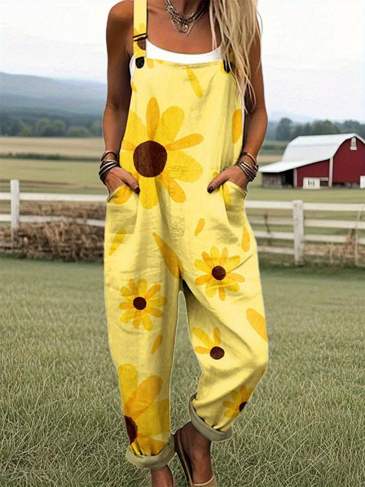 Damesoverall in grote maten met zonnebloemprint, felgele en bruine A-vormige jumpsuit met wijde pijpen, mouwloos ontwerp met korte mouwen en zakken, machinewasbare vrijetijdskleding voor zomer en lente, geschikt voor strand, picknick, vrijetijdskleding