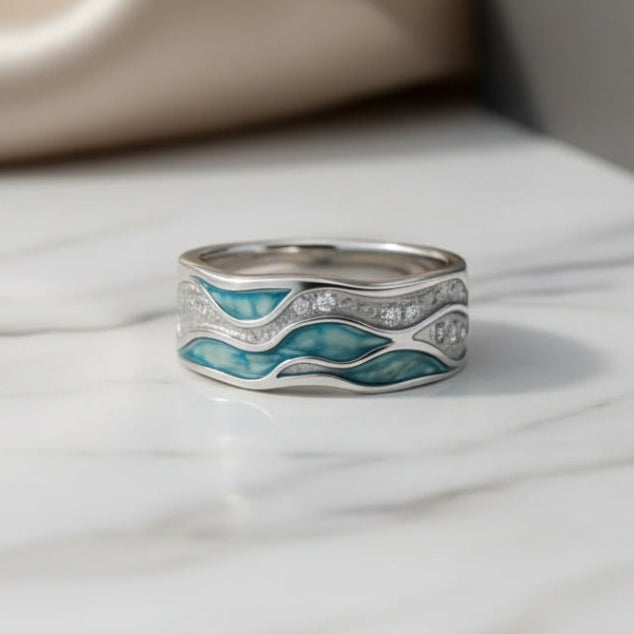 Elegant Silver and Turquoise Ring with Wave Patterns