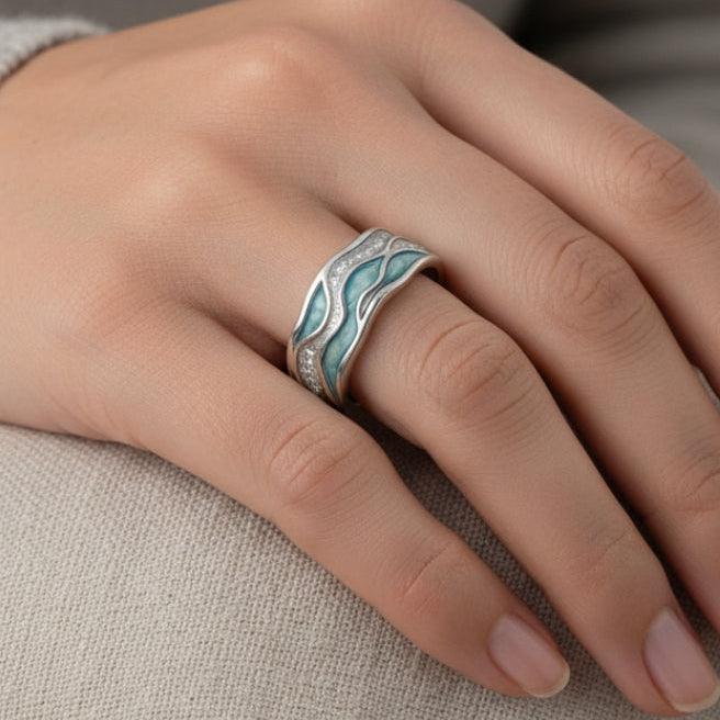 Elegant Silver and Turquoise Ring with Wave Patterns