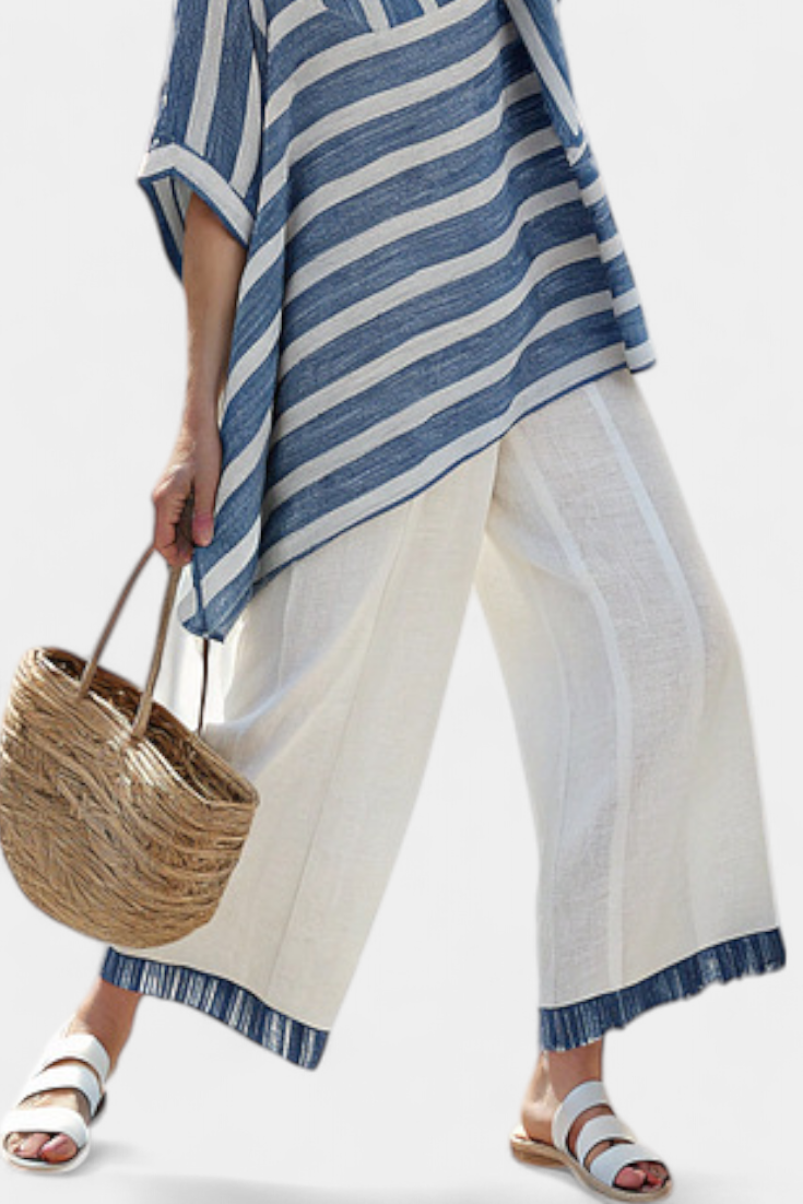 Ornella – sophisticated blue striped top and trousers with hem details