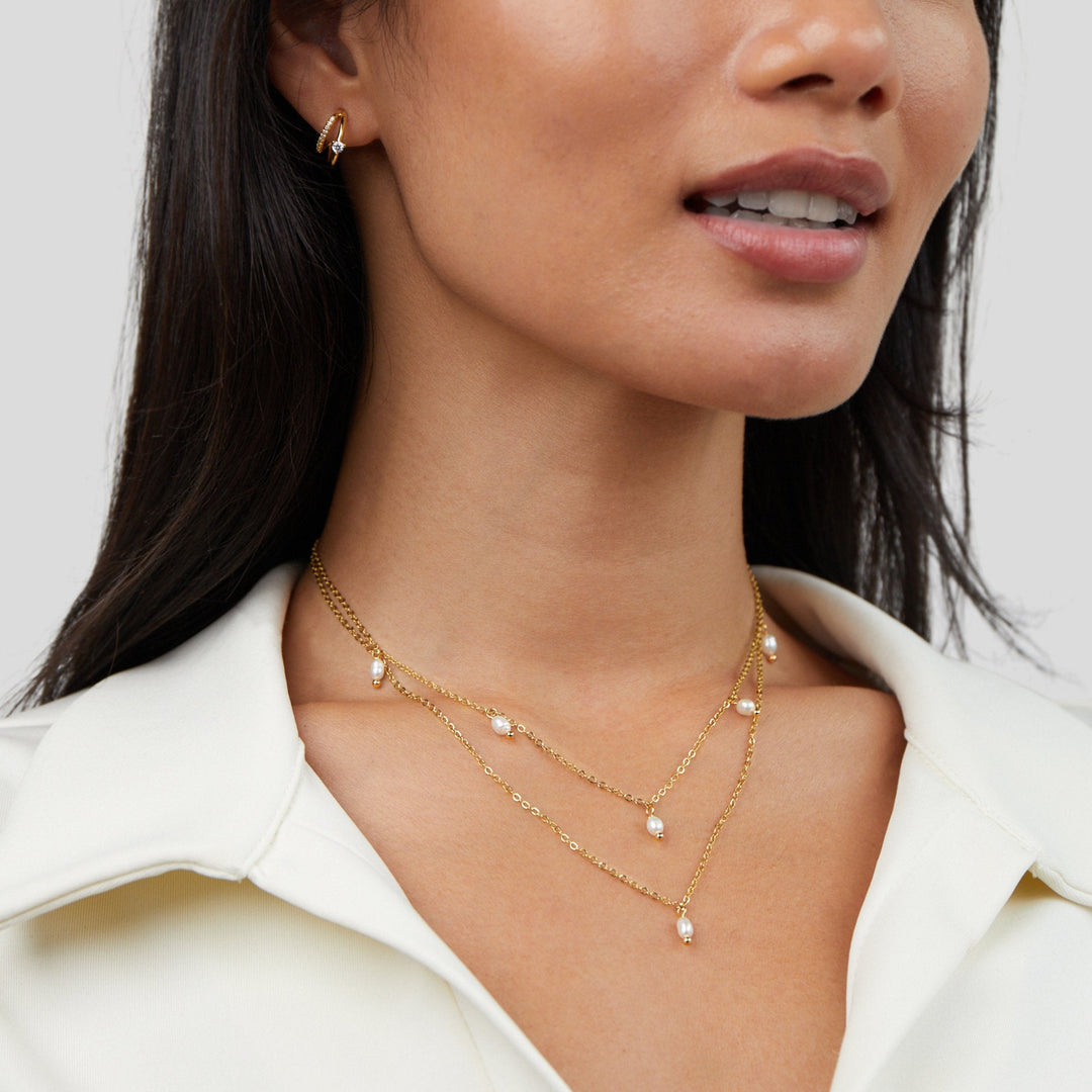 Layered necklace with pearl drops