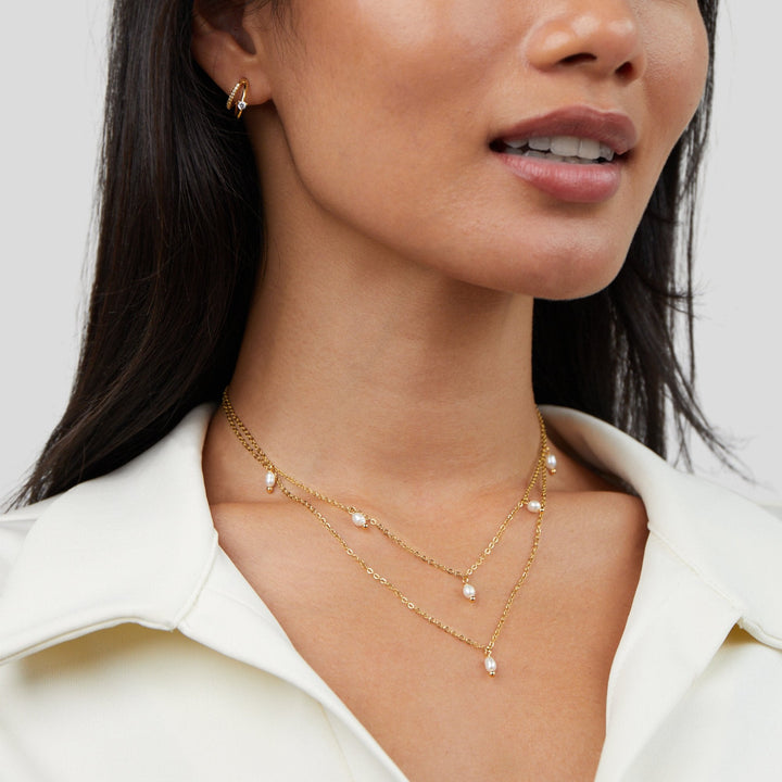 Layered necklace with pearl drops
