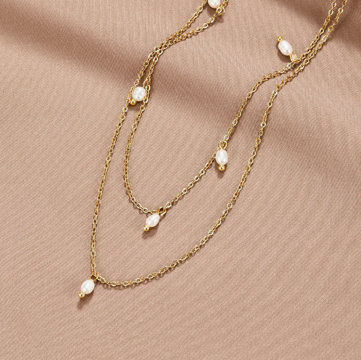 Layered necklace with pearl drops